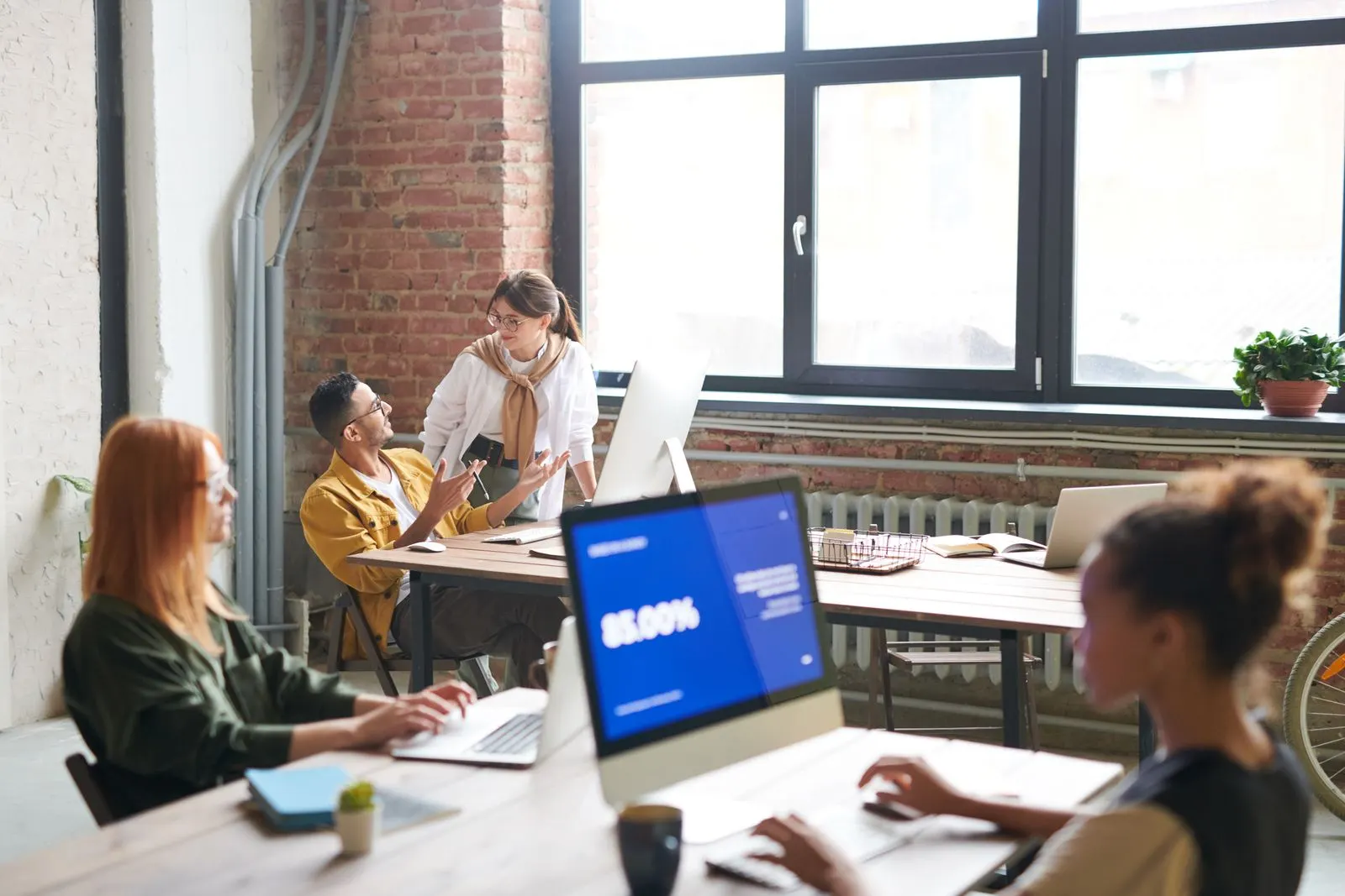 People working together in a Safience-style office